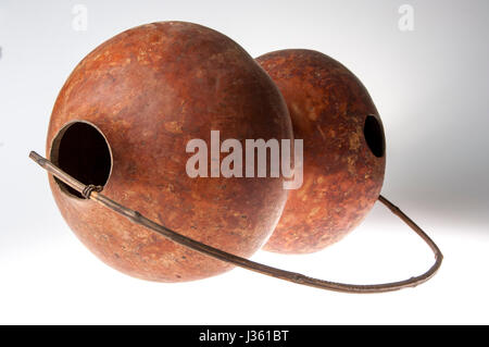 African handmade instrument, blowing, isolated on white background Stock Photo