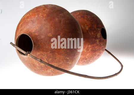 African handmade instrument, blowing, isolated on white background Stock Photo