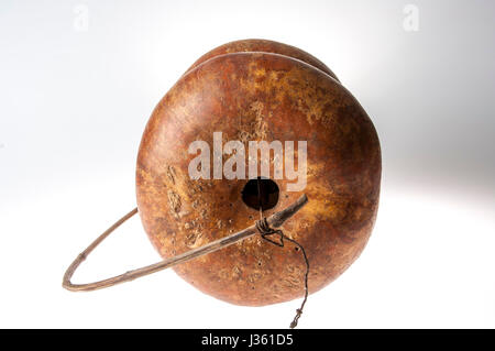 African handmade instrument, blowing, isolated on white background Stock Photo