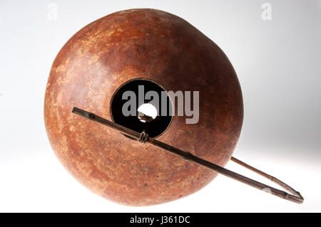 African handmade instrument, blowing, isolated on white background Stock Photo