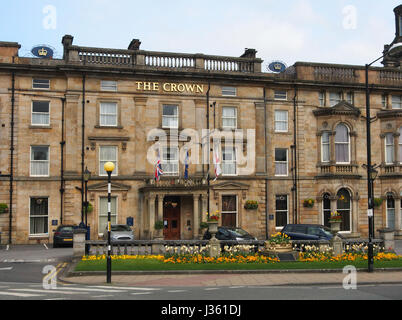 The Crown Hotel, one of the largest in Harrogate.  It is in the northern quarter in the Montpellier district, with lovely gardens in front in spring. Stock Photo