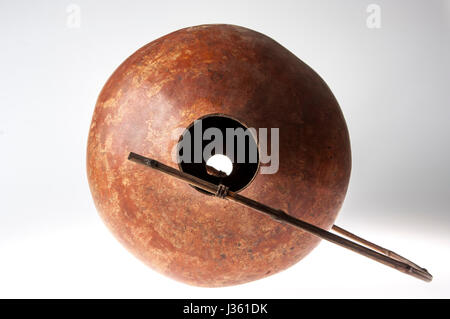 African handmade instrument, blowing, isolated on white background Stock Photo