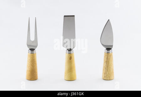 set of cheese knives on white background Stock Photo