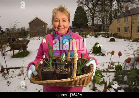 Gardener Val Bourne in the garden of her cottage in the Cotswolds, Gloucestershire,UK Stock Photo