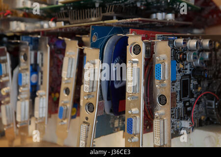 A lot of old dusty computer graphics cards Stock Photo