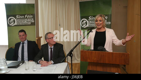 Sinn Fein leader for Northern Ireland Michelle O'Neill congratulates John Finucane (left), son of murdered solicitor Pat Finucane, after he was announced as the party's candidate for North Belfast in the upcoming Westminster election, at an election convention in Belfast also attended by MLA Gerry Kelly (centre). Stock Photo