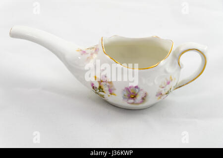 Hand painted antique porcelain creamer Stock Photo