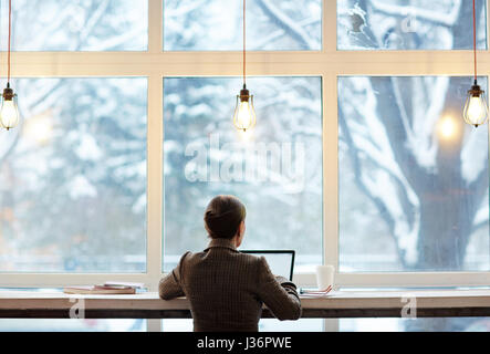 Working in Cafe with Picturesque View Stock Photo