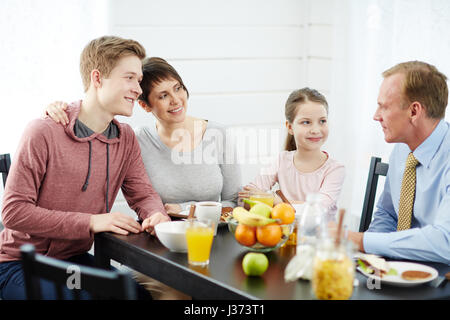 Lovely Family Having Breakfast Together Stock Photo