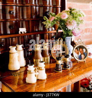 Collection of binoculars on shelf. Stock Photo