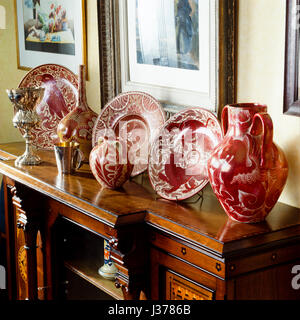 Cabinet with plates and jugs. Stock Photo