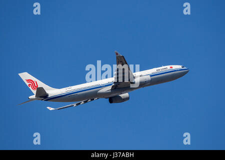 Frankfurt, Germany - March 30, 2017: Air China Airbus A330-300 after take off at the Frankfurt international airport Stock Photo