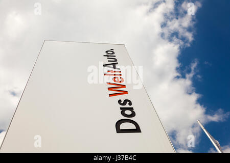 Frankfurt, Germany - March 30, 2017: Das WeltAuto advertising slogan from Volkswagen at a dealership. Das WeltAuto translates to the world car Stock Photo