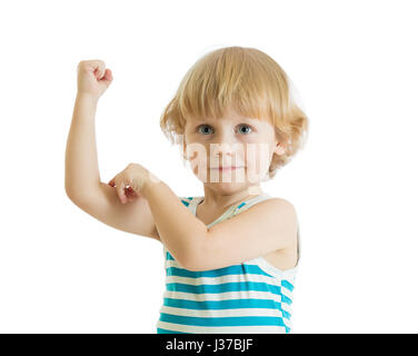 Kid boy child strength training and showing muscles. Stock Photo