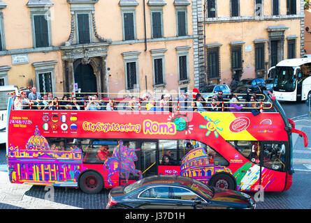 ROME, ITALY - NOVEMBER 02, 2016: Tourist bus with passengers on an Old Town street in Rome, Italy Stock Photo