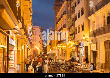 VALENCIA, SPAIN - NOVEMBER 06, 2106: People walking on Old Town street of Valencia. Valencia is the 3rd largest city in Spain. Stock Photo