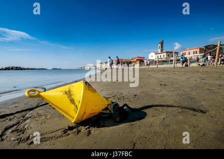 MARINA DI PISA, ITALY - Avril 24, 2017: View of the sea and the beach of white pebbles in Marina di Pisa Tuscany Stock Photo