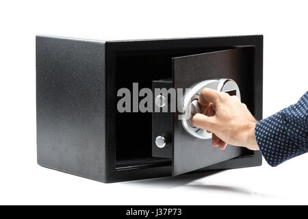 Man hand opened a safe deposit box on a white background Stock Photo