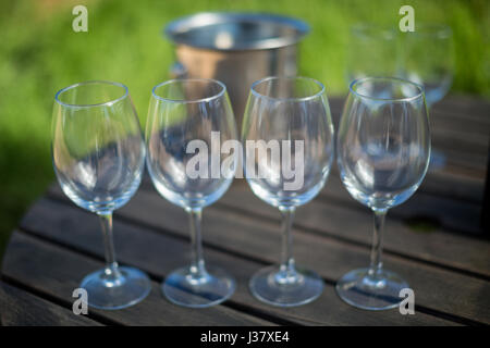 Close up of empty wineglasses on wooden table Stock Photo