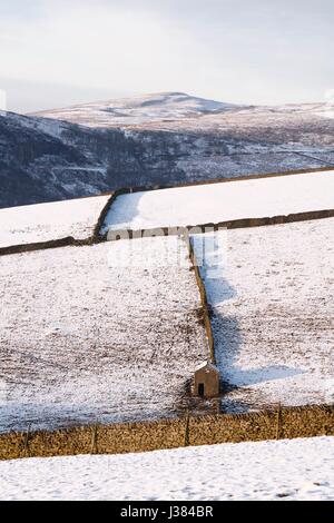Dry stone walls in British countryside in winter, Derbyshire, UK Stock Photo
