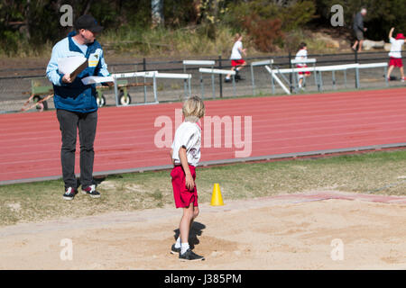 Primary school australian children participating in their primary school annual athletics events,Sydney,Australia Stock Photo