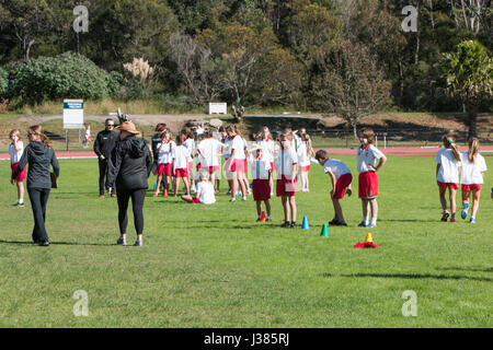 Primary school australian children participating in their primary school annual athletics events,Sydney,Australia Stock Photo