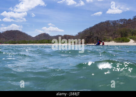 Rajada, Guanacaste, Costa Rica - April 11: Father and daughter enjoying a relaxing kayak ride on the calm waters of this beach. April 11 2017, Rajada, Stock Photo