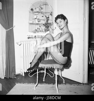 Brigitte Bardot in the appartment where she lives with her husband Roger Vadim,  Boulevard Exelmans in Paris. c.1953-1954 Photo Georges Rétif de la Bretonne  Photo12 does not manage Brigitte Bardot copyright. For all non editorial use, an atuhorization must be asked to Open Art Productions. Open Art Productions 9, rue des Suisses 92380 Garches, France +33(0)1 41 38 85 85 Stock Photo