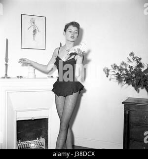 Brigitte Bardot in the appartment where she lives with her husband Roger Vadim,  Boulevard Exelmans in Paris. c.1953-1954 Photo Georges Rétif de la Bretonne  Photo12 does not manage Brigitte Bardot copyright. For all non editorial use, an atuhorization must be asked to Open Art Productions. Open Art Productions 9, rue des Suisses 92380 Garches, France +33(0)1 41 38 85 85 Stock Photo