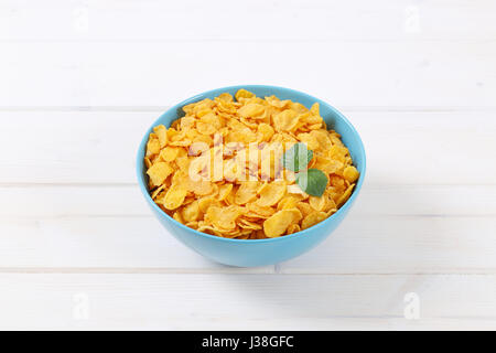 bowl of corn flakes on white background Stock Photo