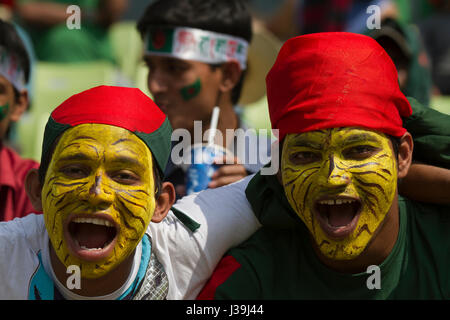 Jubilant cricket fans during the match of the 10th ICC Cricket World Cup at Sher –E- Bangla National Cricket Stadium. Dhaka, Bangladesh. Stock Photo