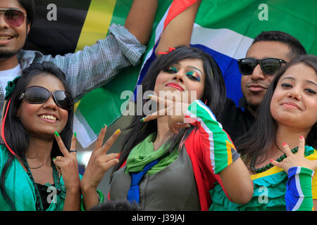 Jubilant cricket fans during the match of the 10th ICC Cricket World Cup at Sher –E- Bangla National Cricket Stadium. Dhaka, Bangladesh. Stock Photo