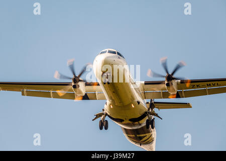 ANZ ATR twin turbo prop airliner on final approach at CHC airport, Christchurch, South Island, New Zealand Stock Photo