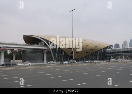 Golden shiny roof of metro station in Dubai city, United Arab Emirates. Dubai Financial District. Transit, subway, construction, Stock Photo