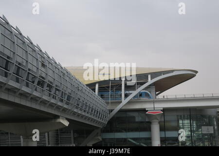 Golden shiny roof of metro station in Dubai city, United Arab Emirates. Dubai Financial District. Transit, subway, construction, Stock Photo