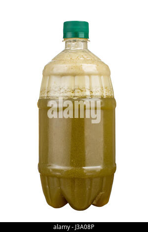 Freshly squeezed juice in a plastic bottle. Lemonade on take-away on a white background. Fresh Juice. isolated. Stock Photo
