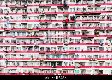 Traditional style apartments in Hong Kong, residents live in cramped conditions. Mong Kok is situated on Kowloon side. Stock Photo