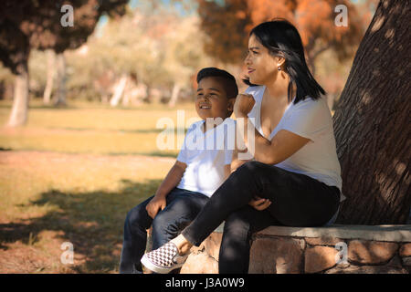 Morther and son in the park Stock Photo