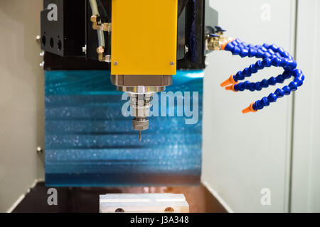 CNC turning machine drilling process in metal industry Stock Photo