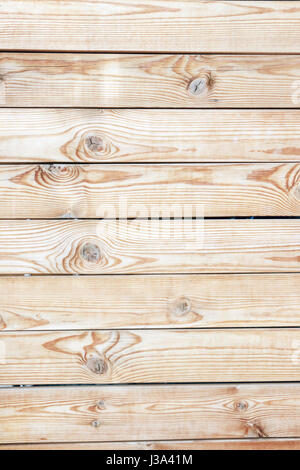 Natural beige wooden background from several rough boards Stock Photo