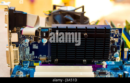 Computer Hardware. Motherboard with video card Stock Photo