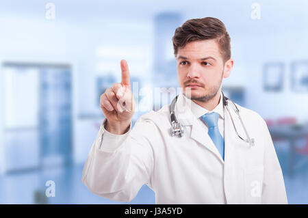 Doctor hand touching empty virtual screen as modern medicine concept with text space Stock Photo