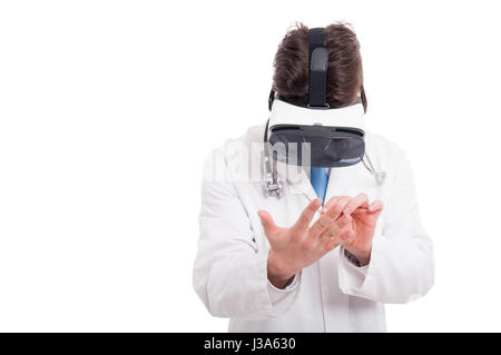 Doctor wearing virtual reality glasses and signing something on white background with copytext space Stock Photo