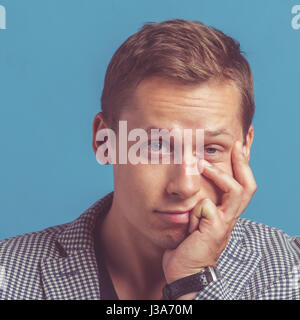 Portrait of young handsome men with emotional face Stock Photo