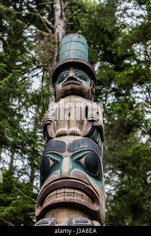 Native American totem poles in Alaska Stock Photo - Alamy