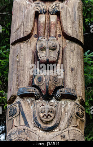 Native American totem poles in Alaska Stock Photo - Alamy