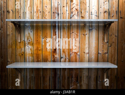 Two glass empty shelf on a wooden background Stock Photo