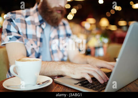 Male Hands Typing on Laptop Stock Photo