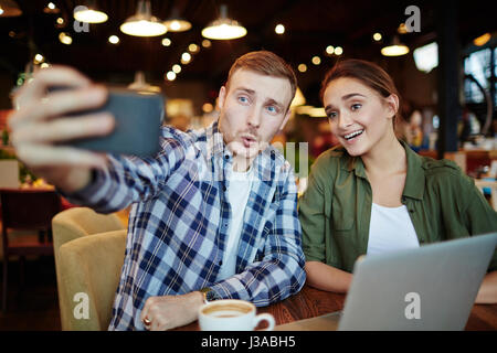 Taking Selfie with Pretty Friend Stock Photo