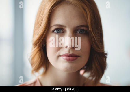 Portrait of beautiful executive in office Stock Photo